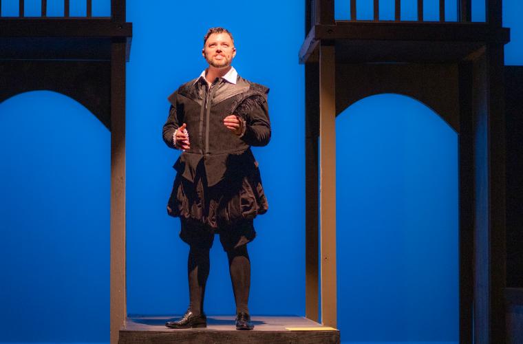 An actor performing Shakespeare on stage at the University of Louisiana at Lafayette.